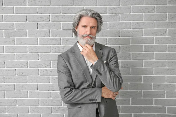 Thoughtful Mature Man Formal Suit Brick Background — Stock Photo, Image