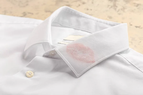 Shirt with lips print on collar, closeup