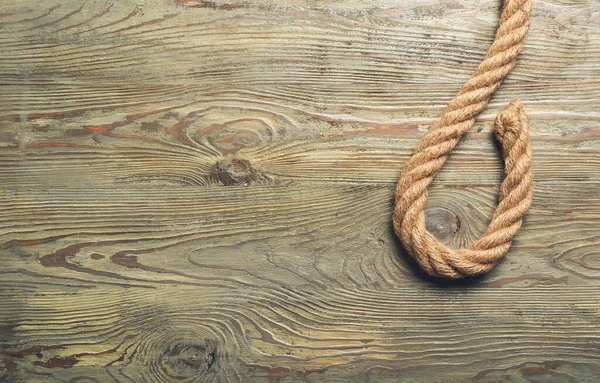 木製の背景にロープを閉じます — ストック写真