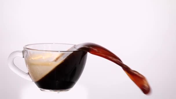 Pouring Coffee Out Glass Cup White Background — Stock Video