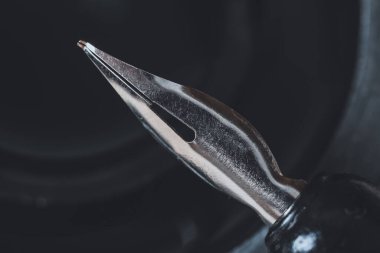 Nib pen and ink, closeup