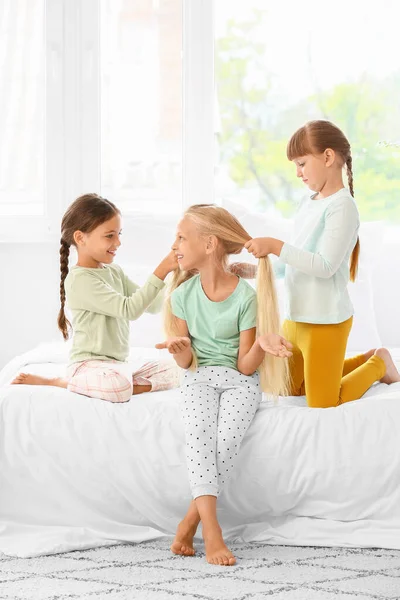 Cute Hairdressers Making Braids Bedroom — Stock Photo, Image
