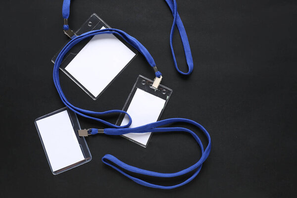 Blank badges on dark background