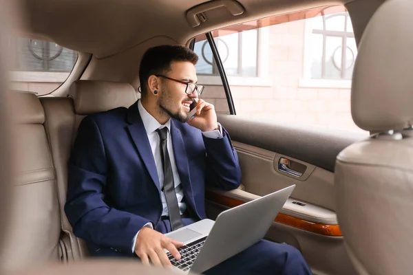 Successful Businessman Laptop Talking Mobile Phone Modern Car — Stock Photo, Image
