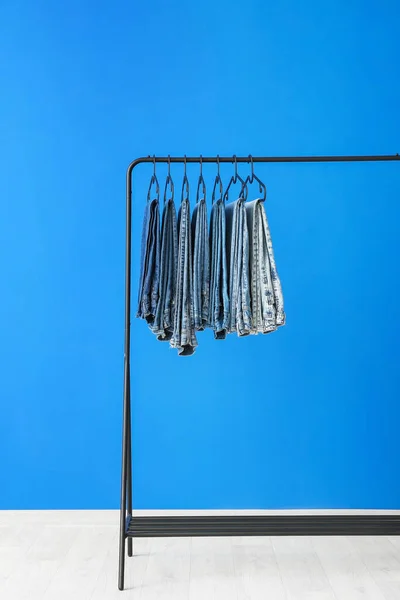 Clothes Rack Jeans Color Wall — Stock Fotó