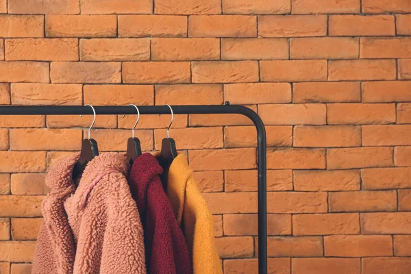 Rack Clothes Brick Wall — Stock Photo, Image