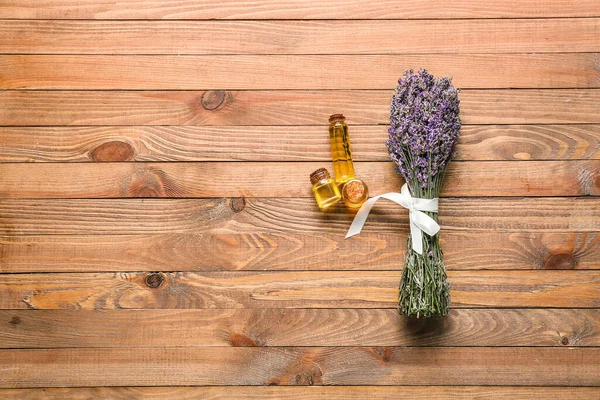 Lavender Bouquet Bottles Essential Oil Wooden Background — Stock Photo, Image
