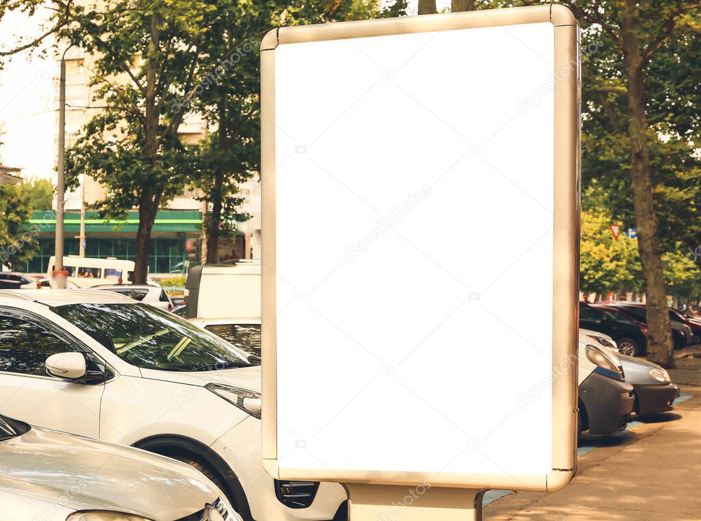 Blank advertising billboard on city street