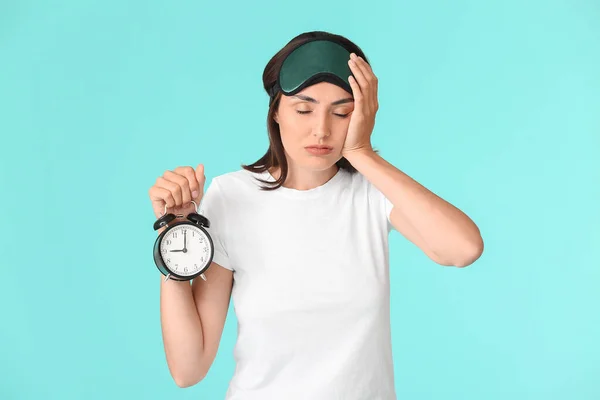Portrait Young Woman Pajamas Sleep Mask Alarm Clock Color Background — Stock Photo, Image