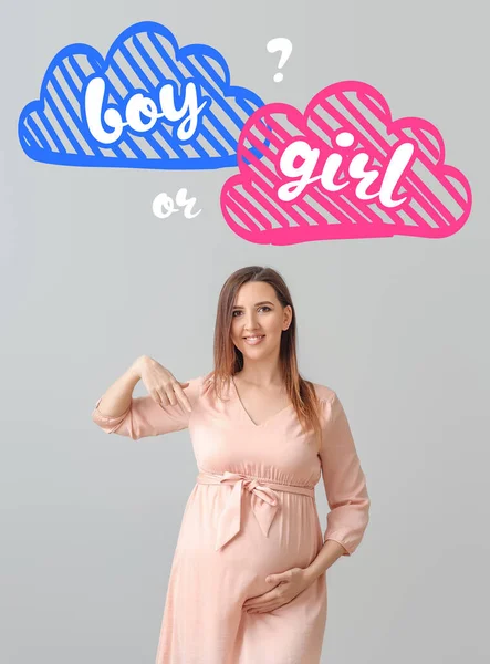 Schöne Schwangere Frau Denkt Über Das Geschlecht Ihres Babys Auf — Stockfoto