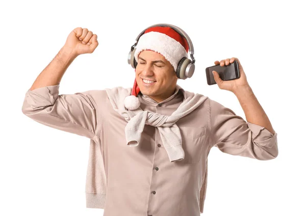 Ung Man Lyssnar Julmusik Vit Bakgrund — Stockfoto