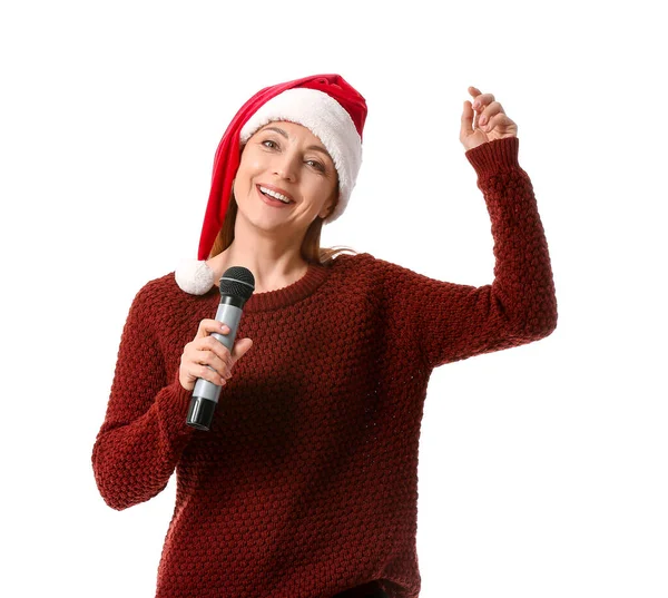 Mikrofonlu Olgun Bir Kadın Beyaz Arka Planda Noel Şarkısı Söylüyor — Stok fotoğraf