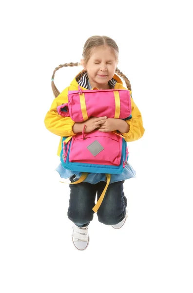 Springen Klein Schoolmeisje Witte Achtergrond — Stockfoto