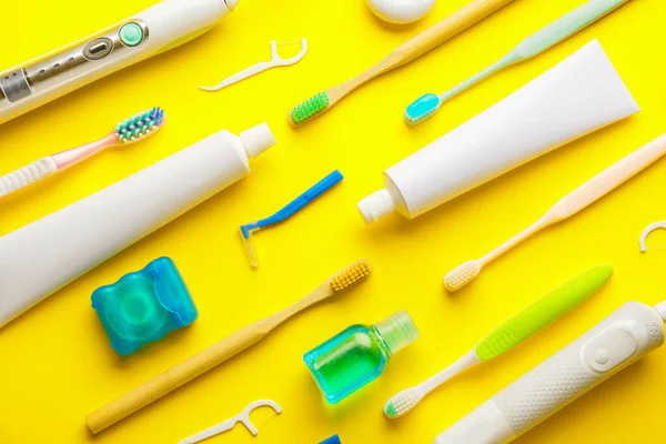 Set for oral hygiene on color background