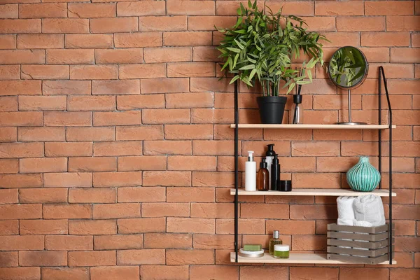 Modern Shelf Body Care Cosmetics Accessories Brick Wall Bathroom — Stock Photo, Image