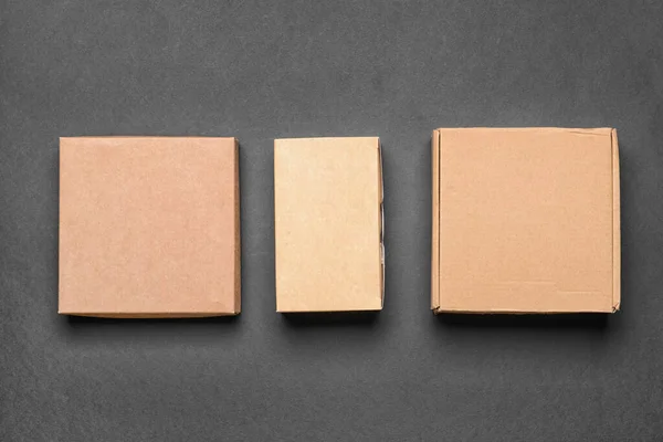 Blank Cardboard Boxes Dark Background — Stock Photo, Image