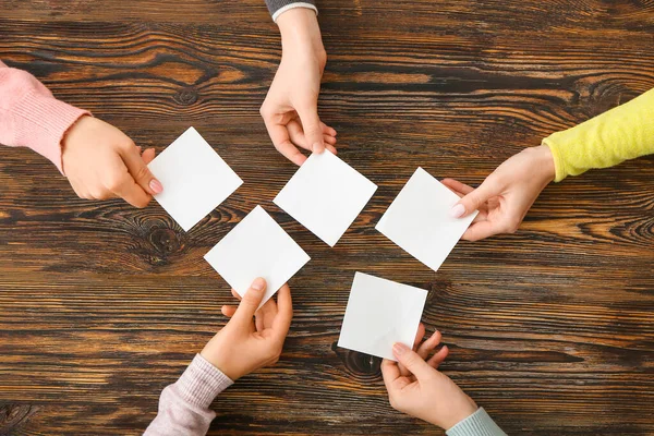 People Hands Blank Papers Wooden Background — Stock Photo, Image