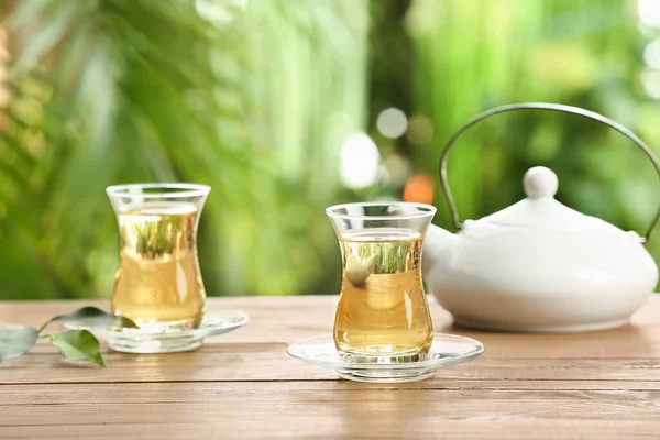 Glasses Green Tea Teapot Table Blurred Background — Stock Photo, Image