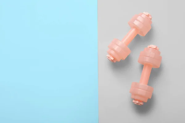 Stylish Dumbbells Color Background — Stock Photo, Image