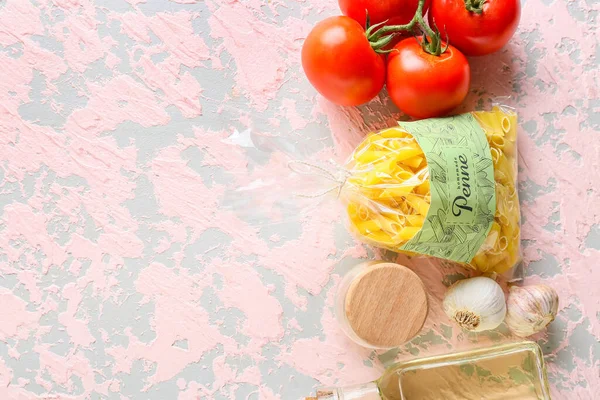 Bag Uncooked Pasta Oil Tomatoes Light Background — Stock Photo, Image