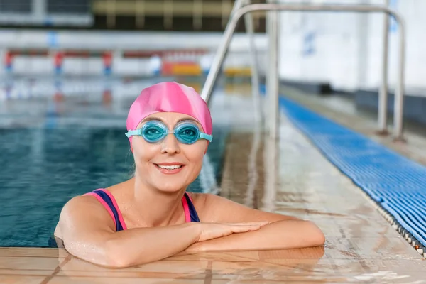 Sporty female swimmer in pool