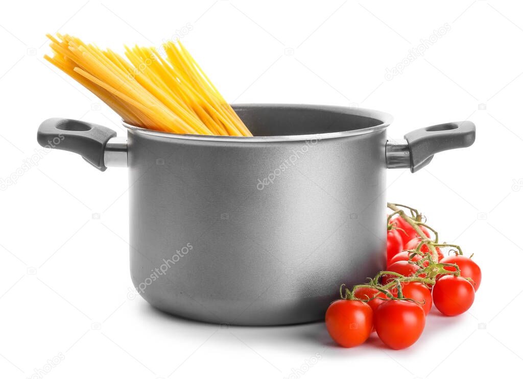 Cooking pot with pasta and vegetables isolated on white background