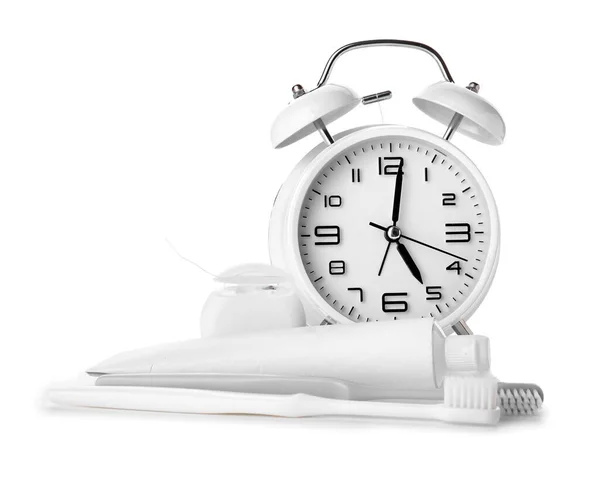 Alarm Clock Paste Toothbrushes White Background — Stock Photo, Image