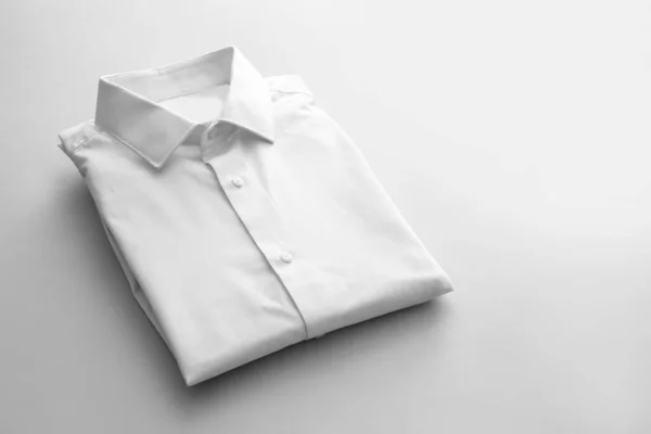 Folded Male Shirt Light Background — Stock Photo, Image