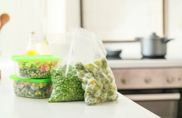 Plastic Containers Bags Frozen Vegetables Table — Stock Photo, Image