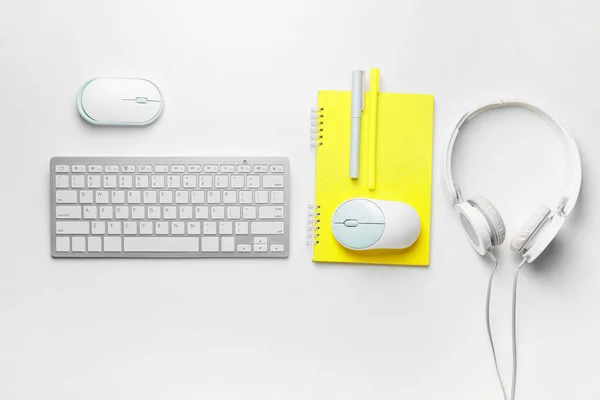 Composition Computer Keyboard Mouse Headphones Stationery White Background — Zdjęcie stockowe