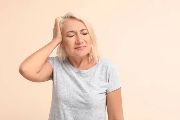 Stressed Mature Woman Suffering Headache Color Background — Stock Photo, Image