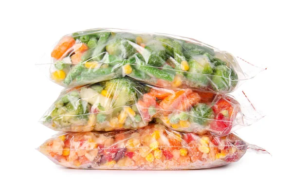 stock image Frozen vegetables in plastic bags on white background