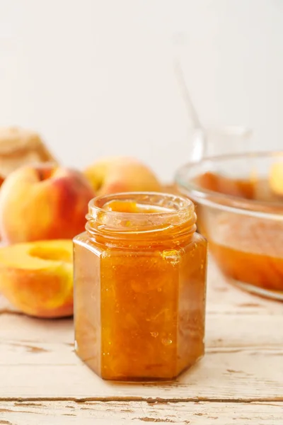Jar Tasty Peach Jam Wooden Table — Stock Photo, Image