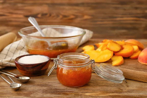 Jar Tasty Peach Jam Wooden Table — Stock Photo, Image