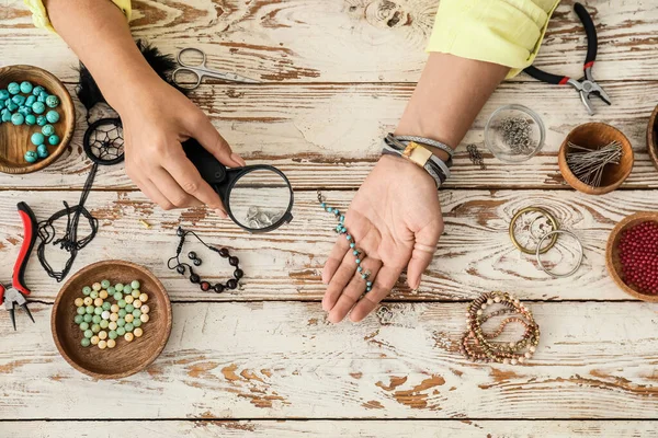 Female Designer Making Jewelry Wooden Background — Stock Photo, Image