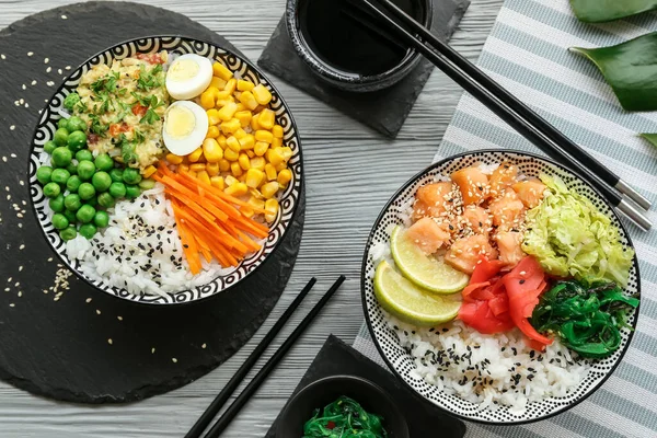 Bowls Tasty Rice Eggs Vegetables Wooden Background — Stock Photo, Image