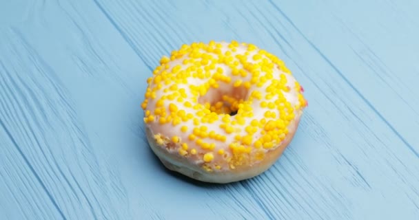 Sweet Tasty Donut Oncolor Wooden Background — Stock Video