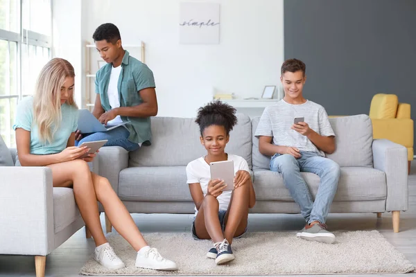 Teenagers Different Devices Home — Stock Photo, Image