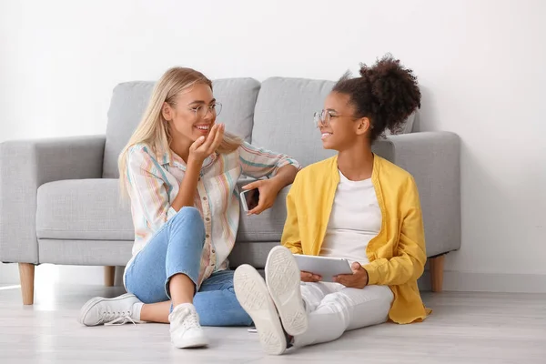 Teenage Girls Different Devices Home — Stock Photo, Image