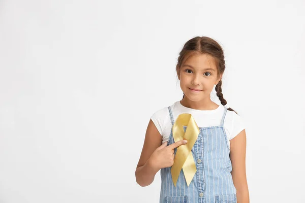 Little Girl Golden Ribbon Light Background Childhood Cancer Awareness Concept — Stock Photo, Image