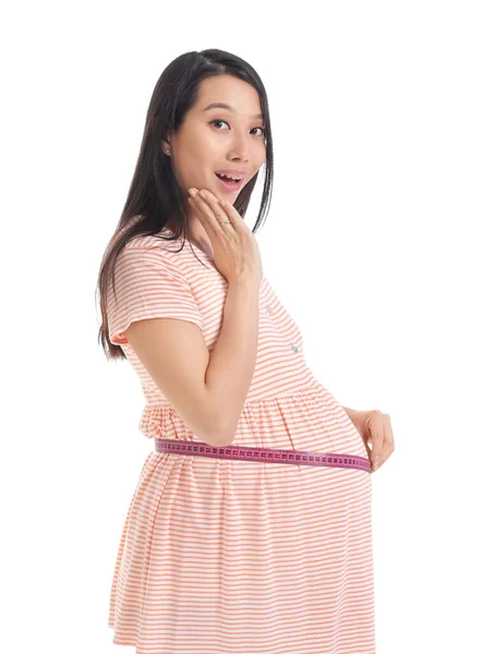 Surprised Pregnant Asian Woman Measuring Her Belly White Background — Stock Photo, Image