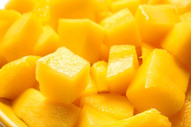 Arka plan olarak tatlı kesilmiş mango