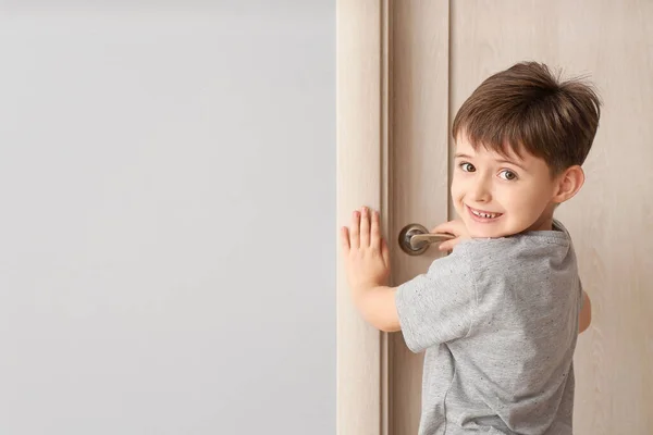 Cute Little Boy Standing Closed Door — Stock Photo, Image