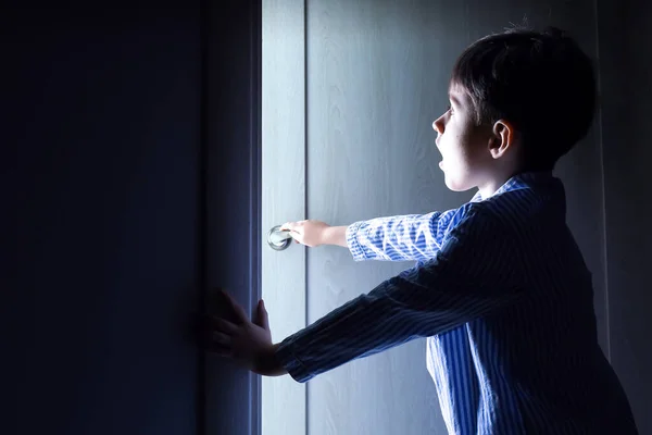 Little Boy Peeking Open Door Darkness — Stock Photo, Image