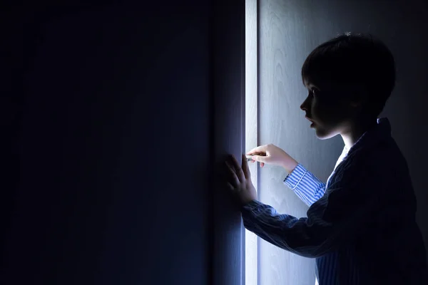 Little Boy Peeking Open Door Darkness — Stock Photo, Image