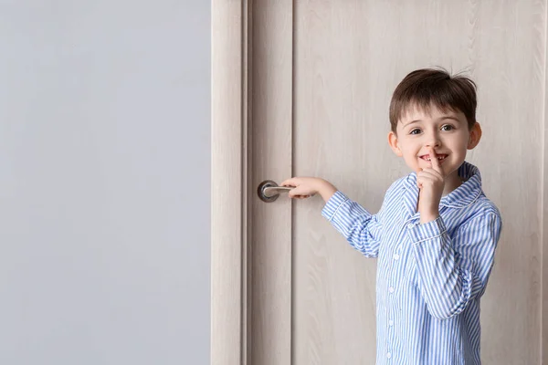 Cute Little Boy Showing Silence Gesture Closed Door — Stock Photo, Image