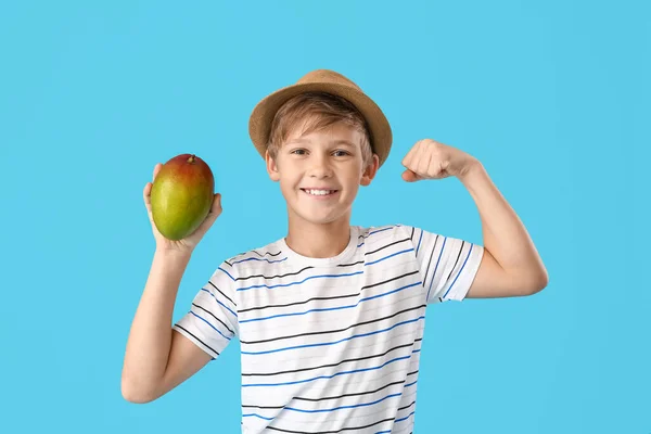 Cute Little Boy Fresh Tasty Mango Color Background — Stock Photo, Image