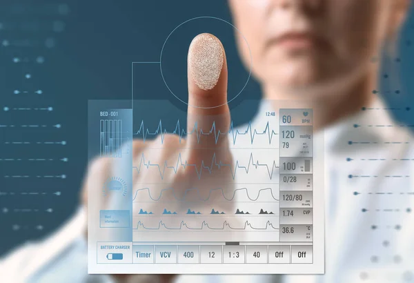 Emergency physician using patient monitoring system, closeup. Innovative technologies in medicine