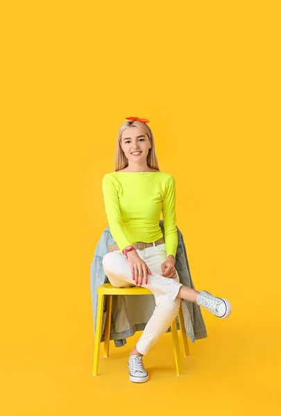 Beautiful Young Woman Sitting Chair Color Background — Stock Photo, Image