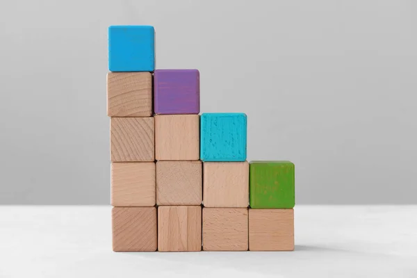 Different Wooden Cubes Table — Stock Photo, Image